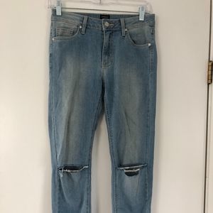 Light wash denim with fringe bottom